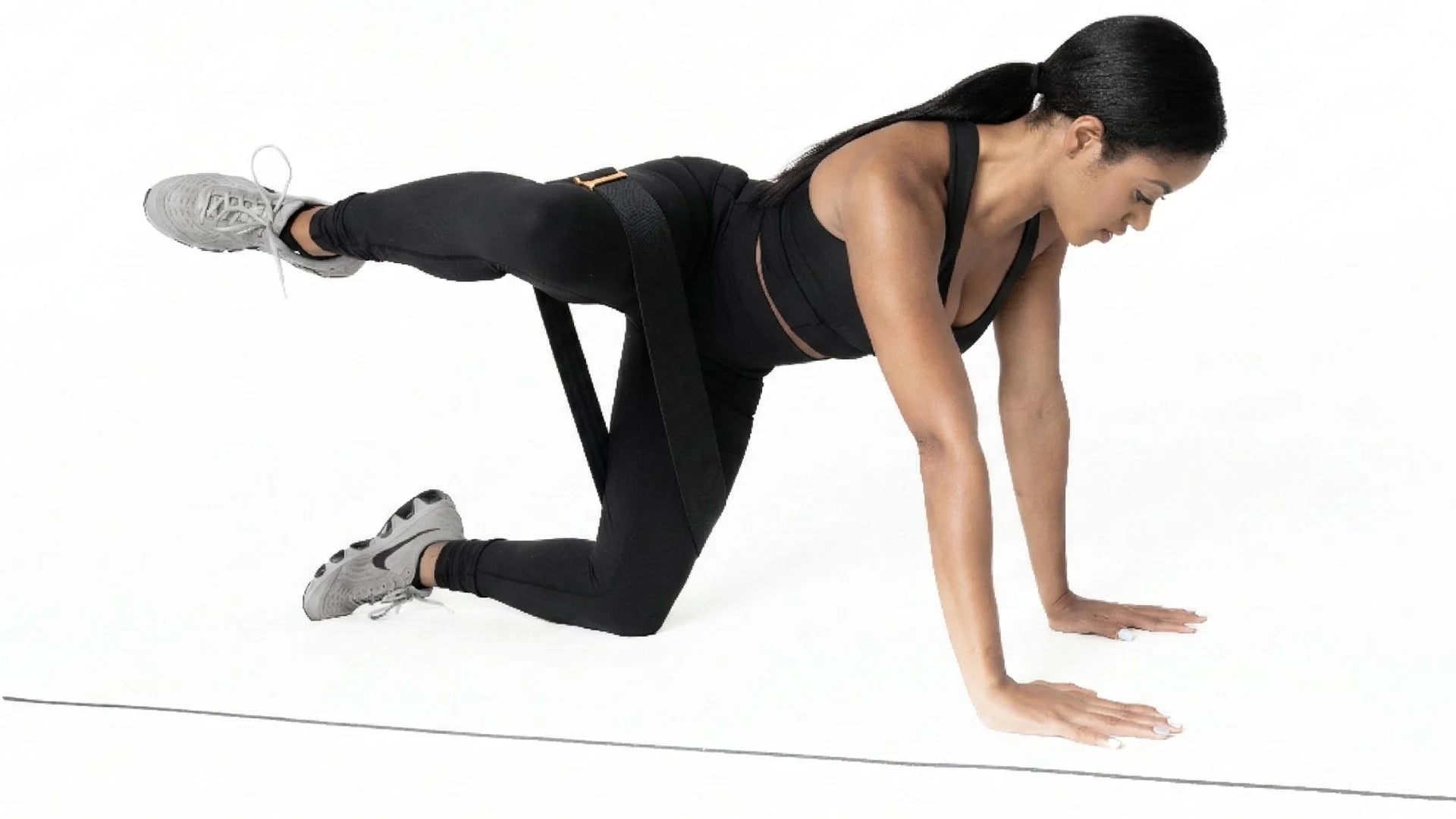 Woman performing a push-up using Band