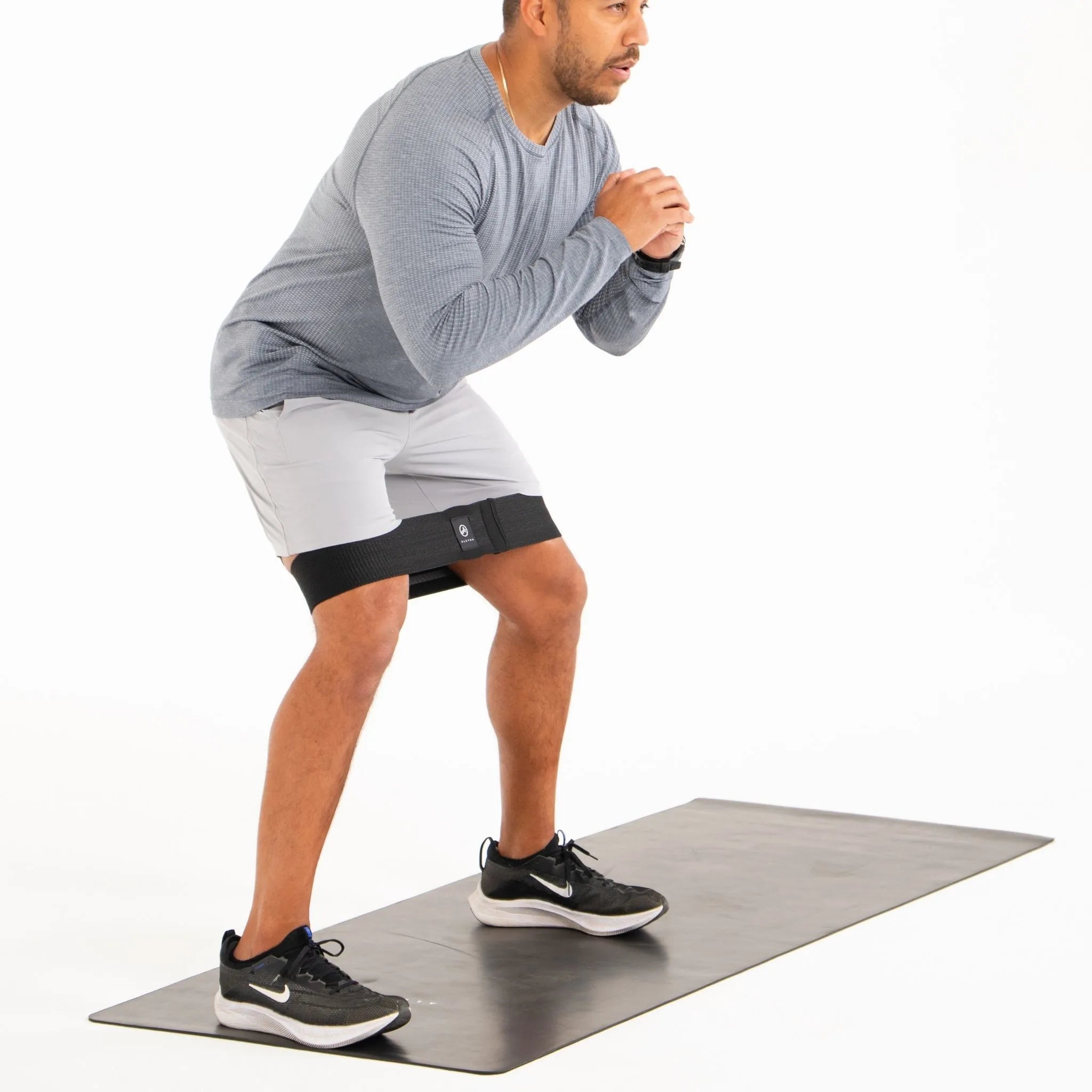 sumo squats with exercise band