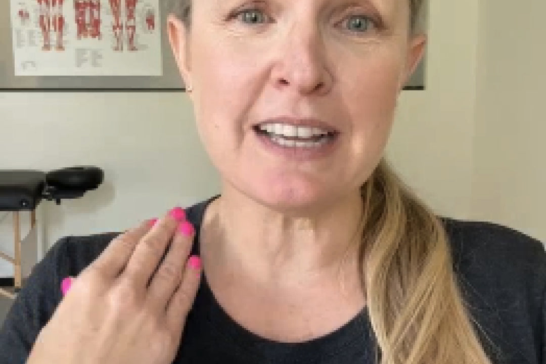 Woman with shoulder blade pain showing her discomfort 