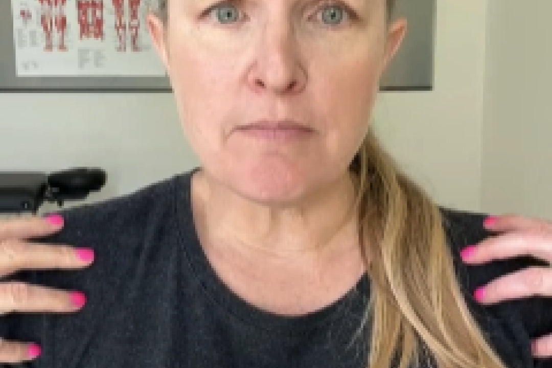 Woman with shoulder pain showing her discomfort