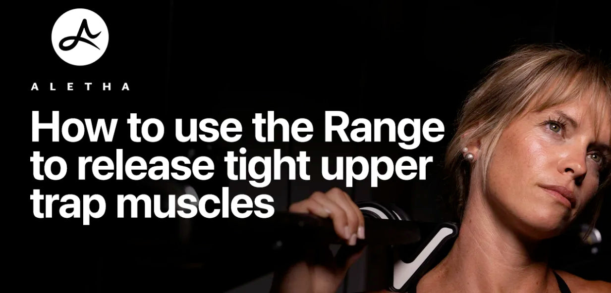 Woman using the Range for upper trap muscles