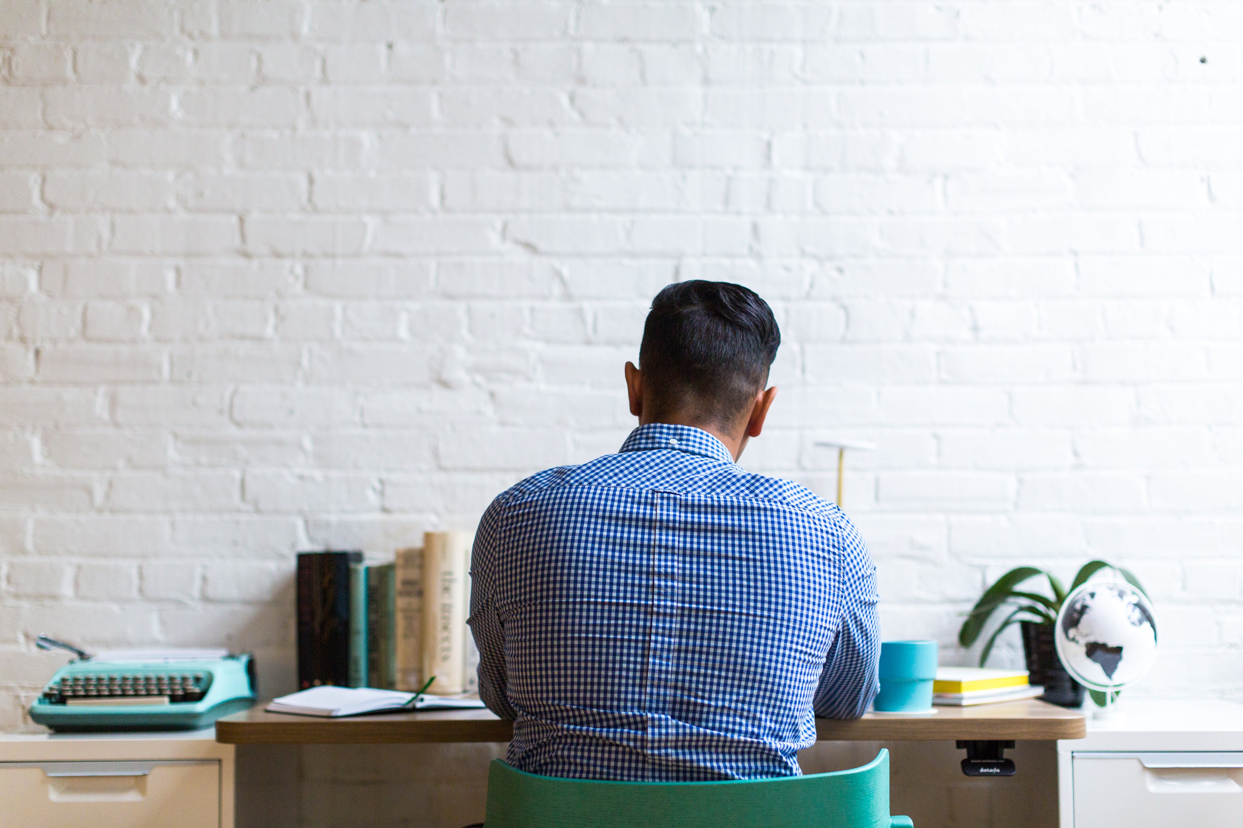 man working at a desk
